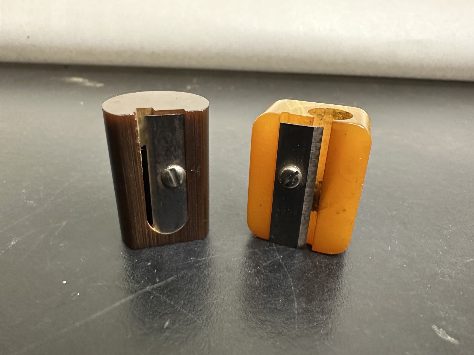 (2) Vintsge Butterscotch and Brown Bakelite Pencil Sharpener Germany