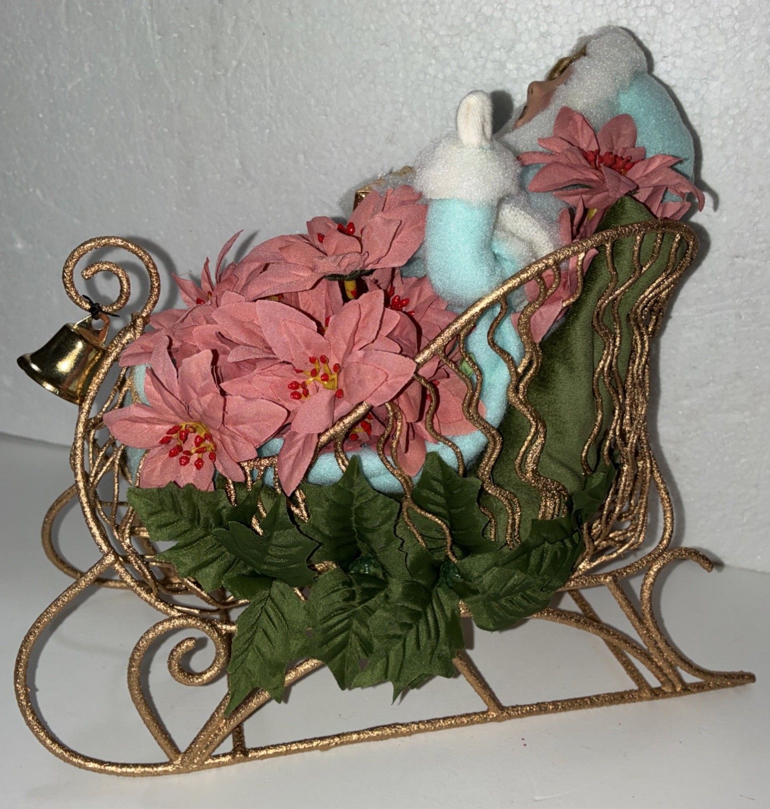 Buyers Choice Singing Girl in Sleigh with Gift, Bell And Poinsettias, 10.5” X 9”