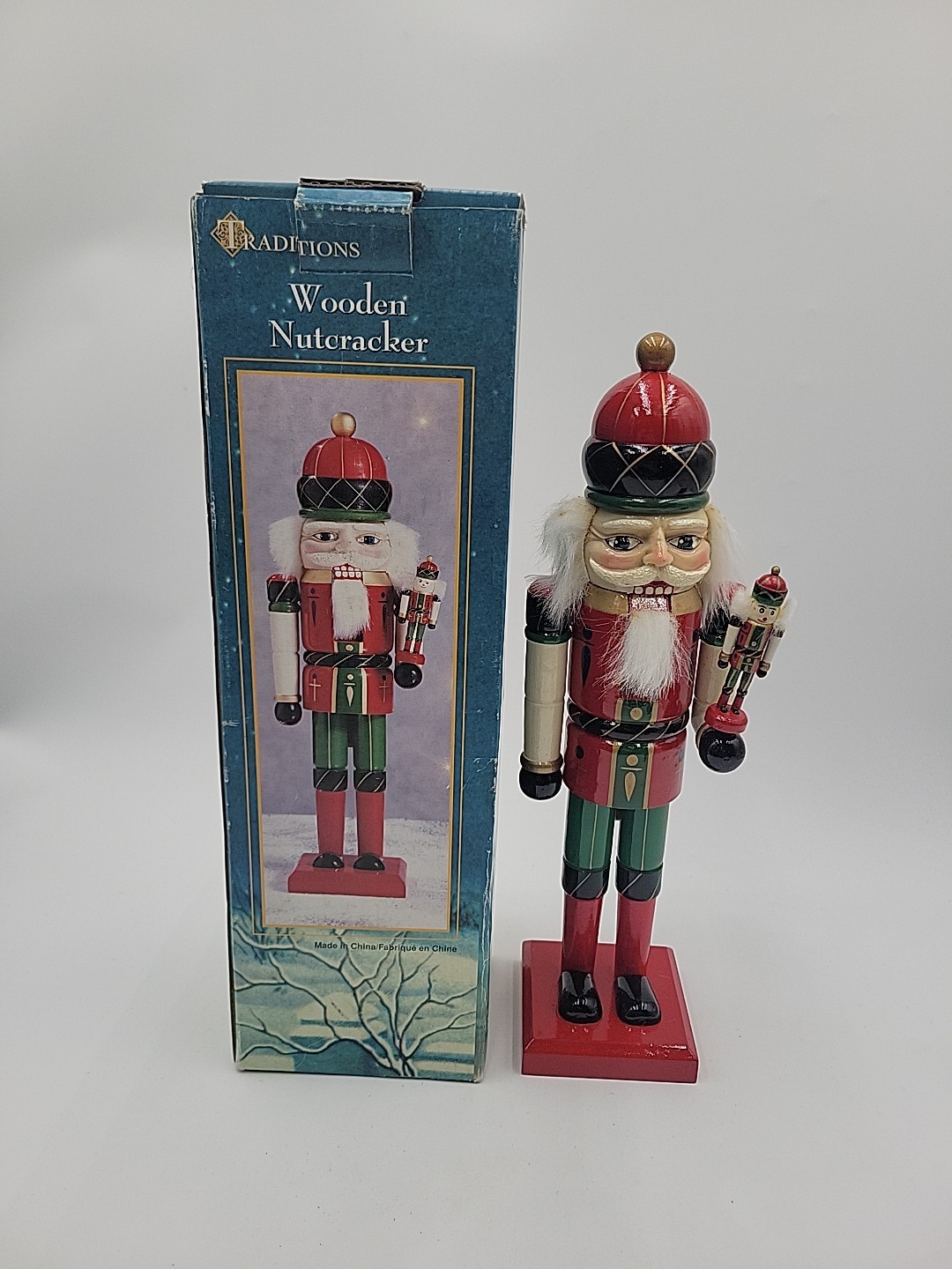 Traditions Wooden Nutcracker 14″ Holding Smaller Nutcracker Red Green Gold