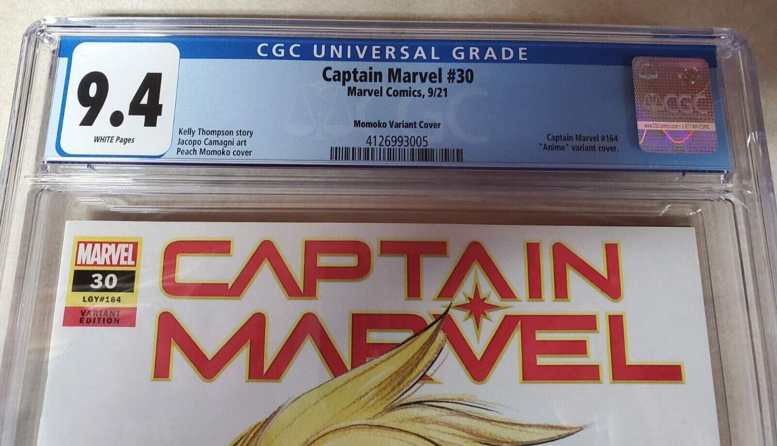 Captain Marvel Issue #30 Comic Book. Peach Momoko Variant Cover. CGC Graded.2021