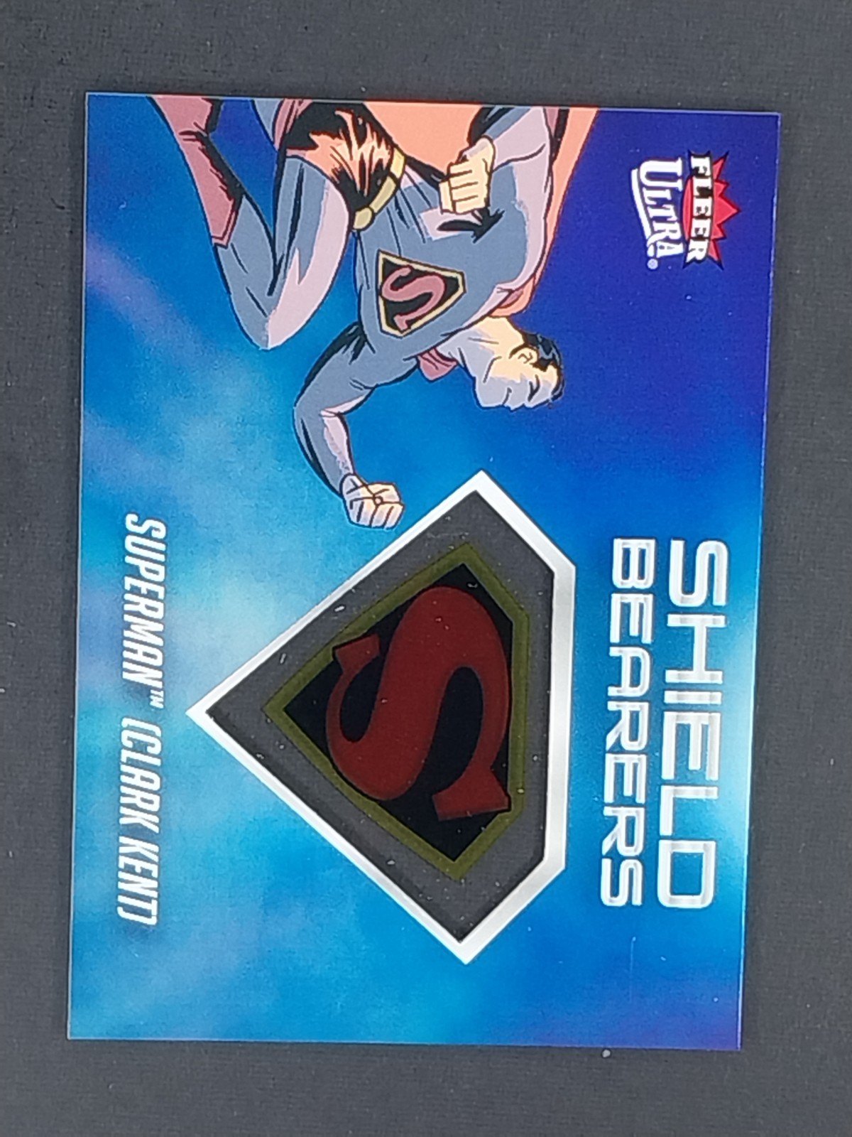 Superman 2026 Fleer Ultra Shield Bearers #SB-16 Clark Kent Insert