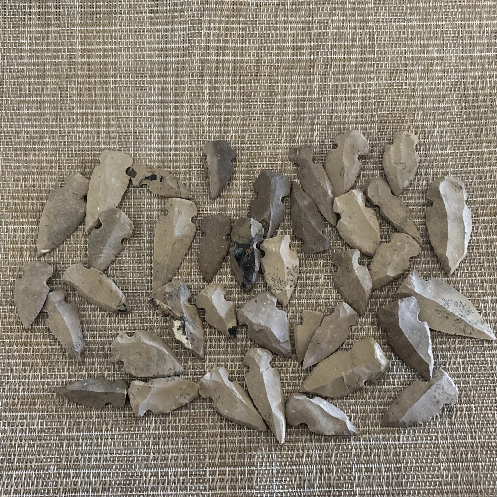 10 Flint Arrowheads 1-1/2 – 2 inches long. Replicas, modern made