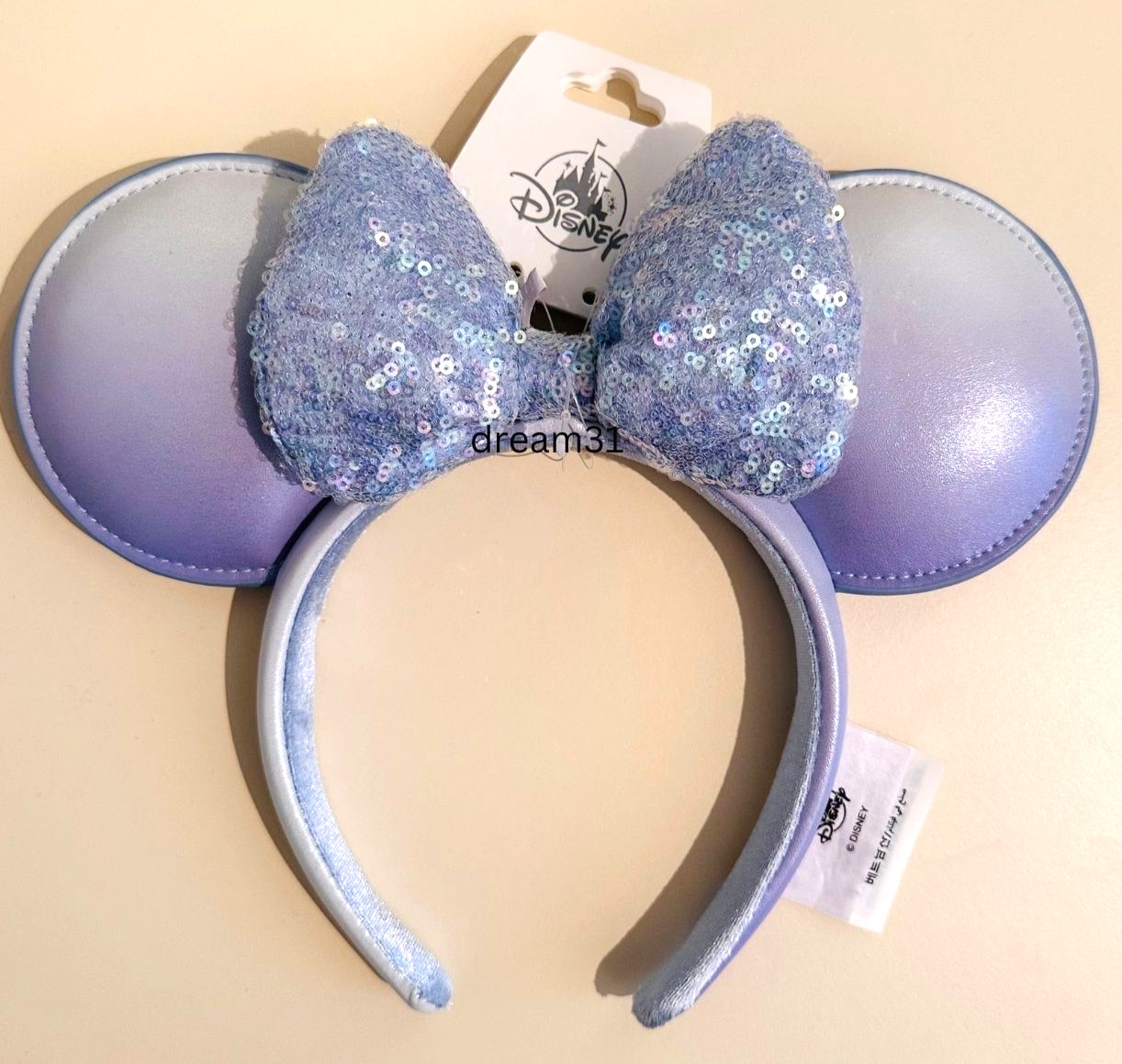 BNWT Disney Parks Minnie Mouse Winter Blue with sequined bow Ears Headband Adult