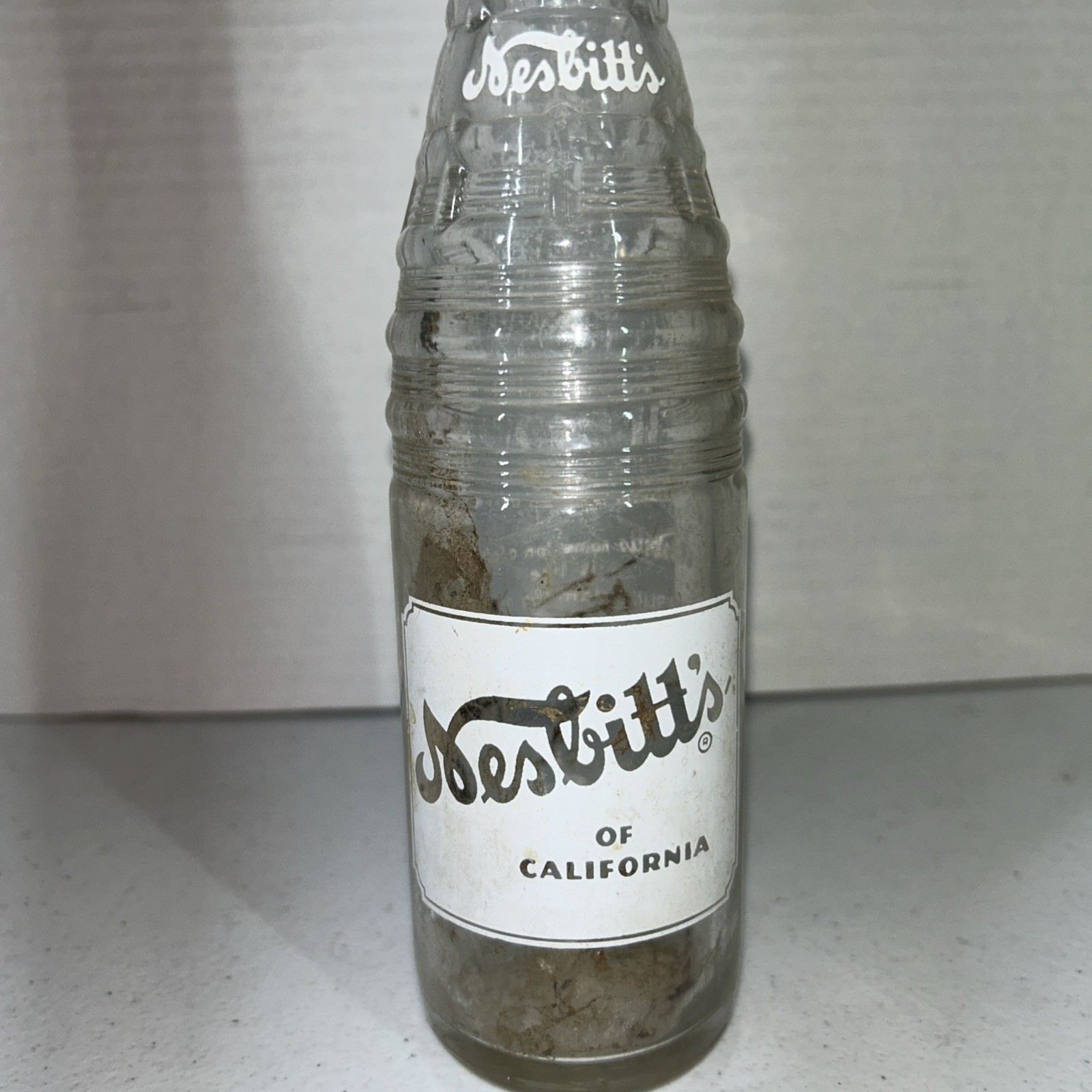 Nesbitt’s of California 10 fl oz. Bottle ACL “STERLING Stamped On Silver”