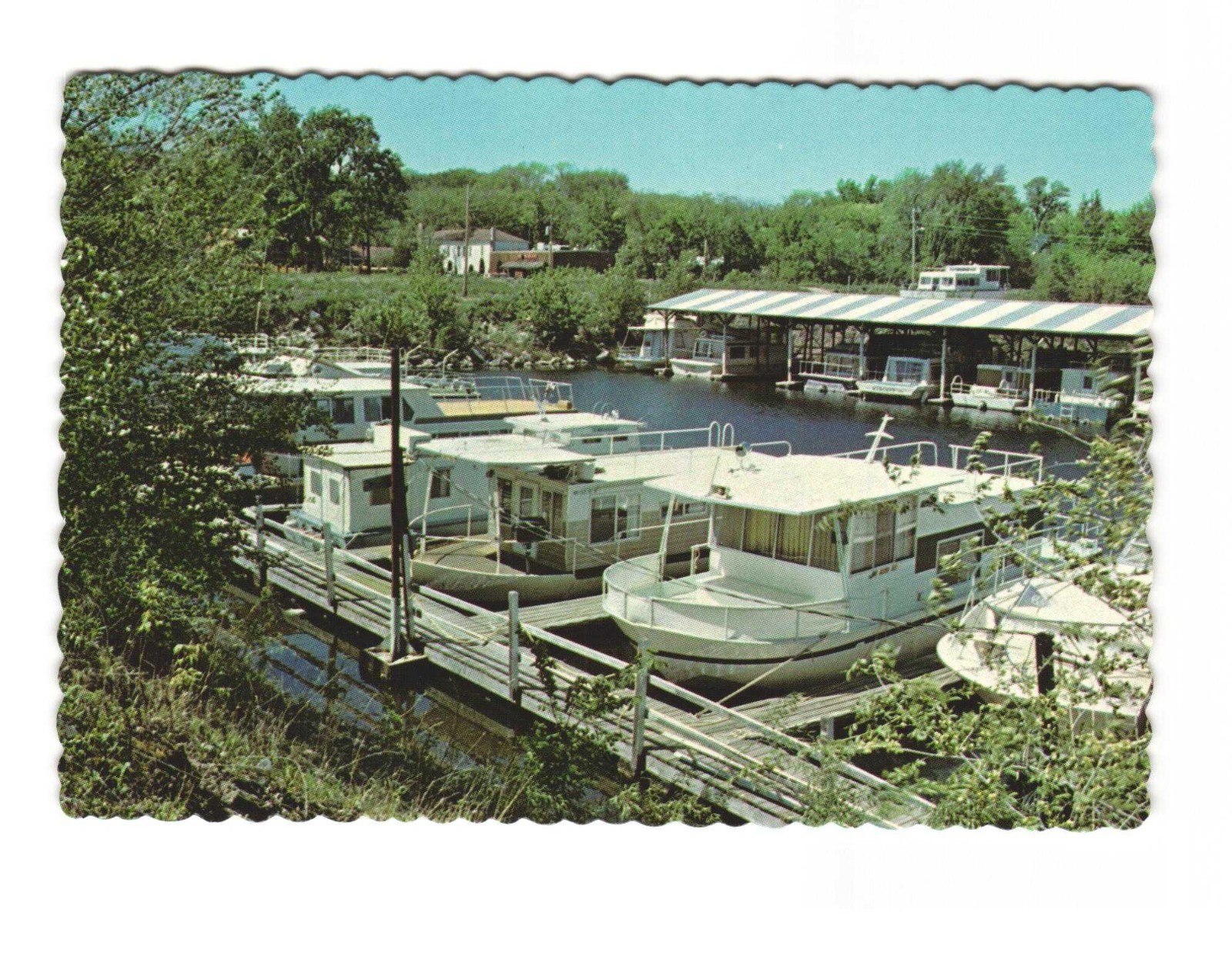 Afton Marina with the Afton House the Catfish Saloon Old Bank Building postcard