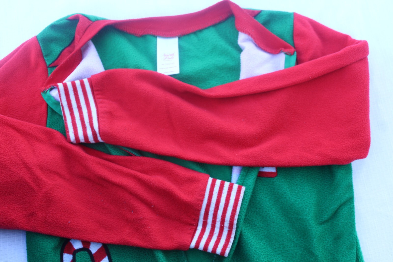 North Pole Trading Co Elf Pajama One Piece Santa’s Helper Unisex Kids M (10/12)