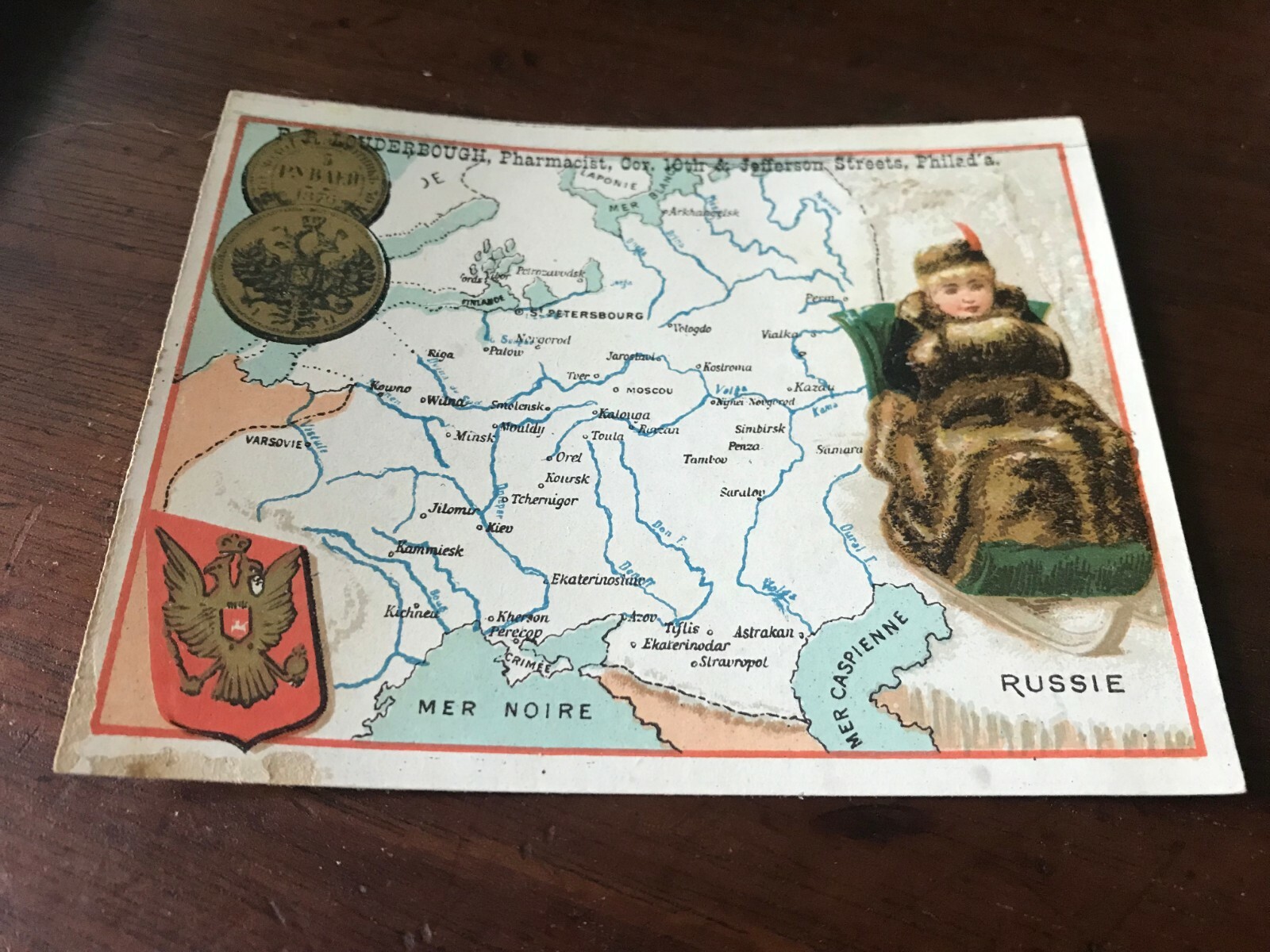 1800’s F P Louderbough Russian Girl in Fur on Sled Crest Victorian Trade Card