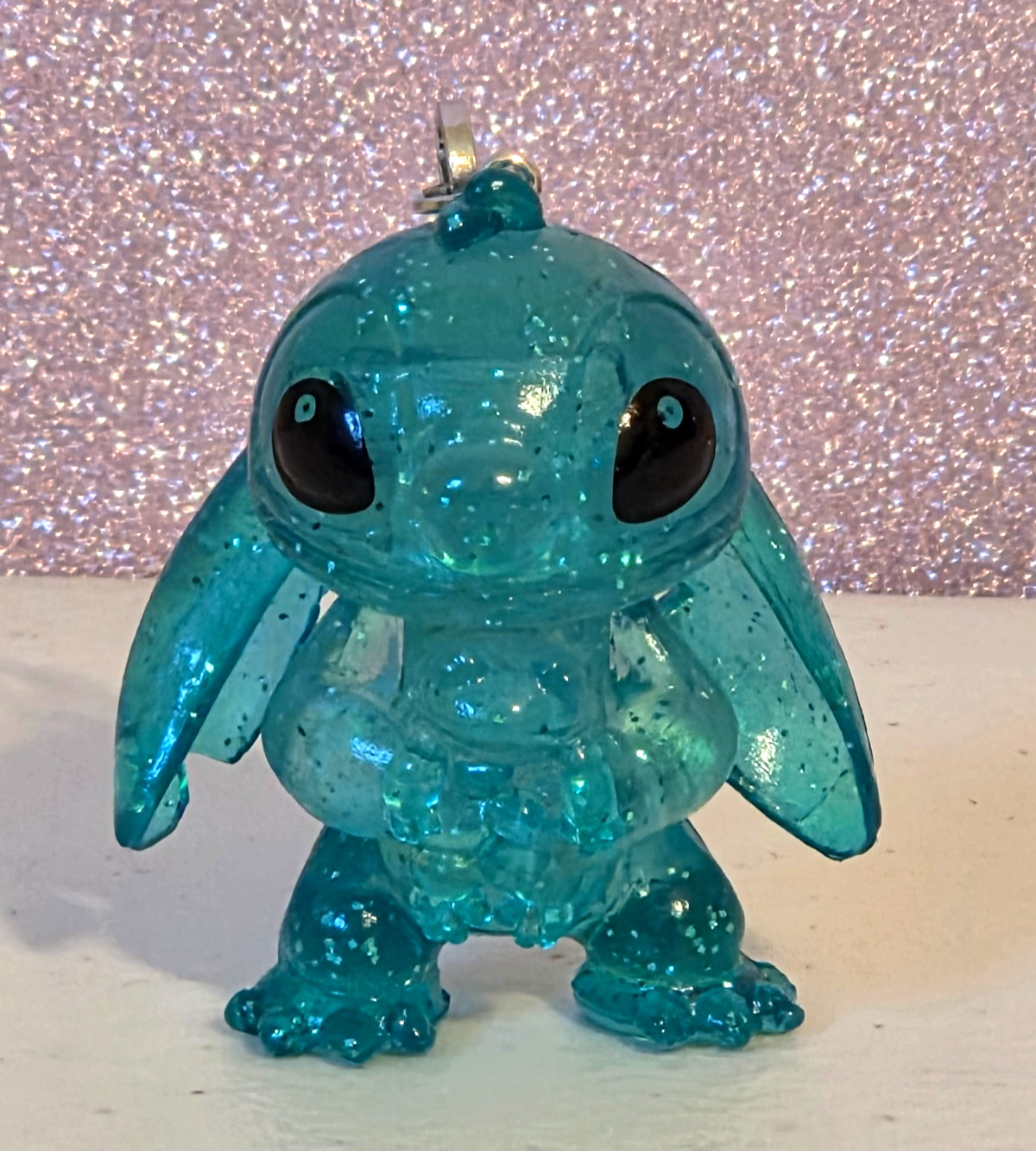 Disney Clear Blue Glitter STITCH holding Scrump Figural Clip-On 2″