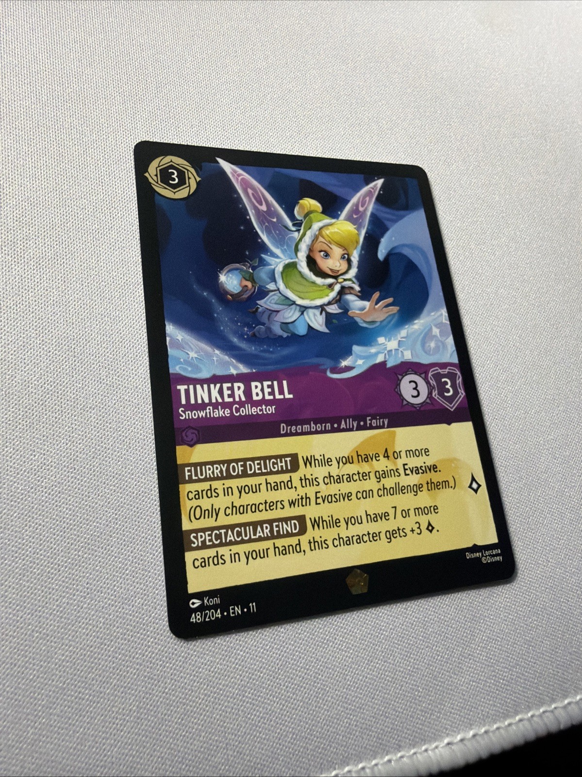 Disney Lorcana Winterspell – Tinker Bell (Foil) – Snowflake Collector – #48/204