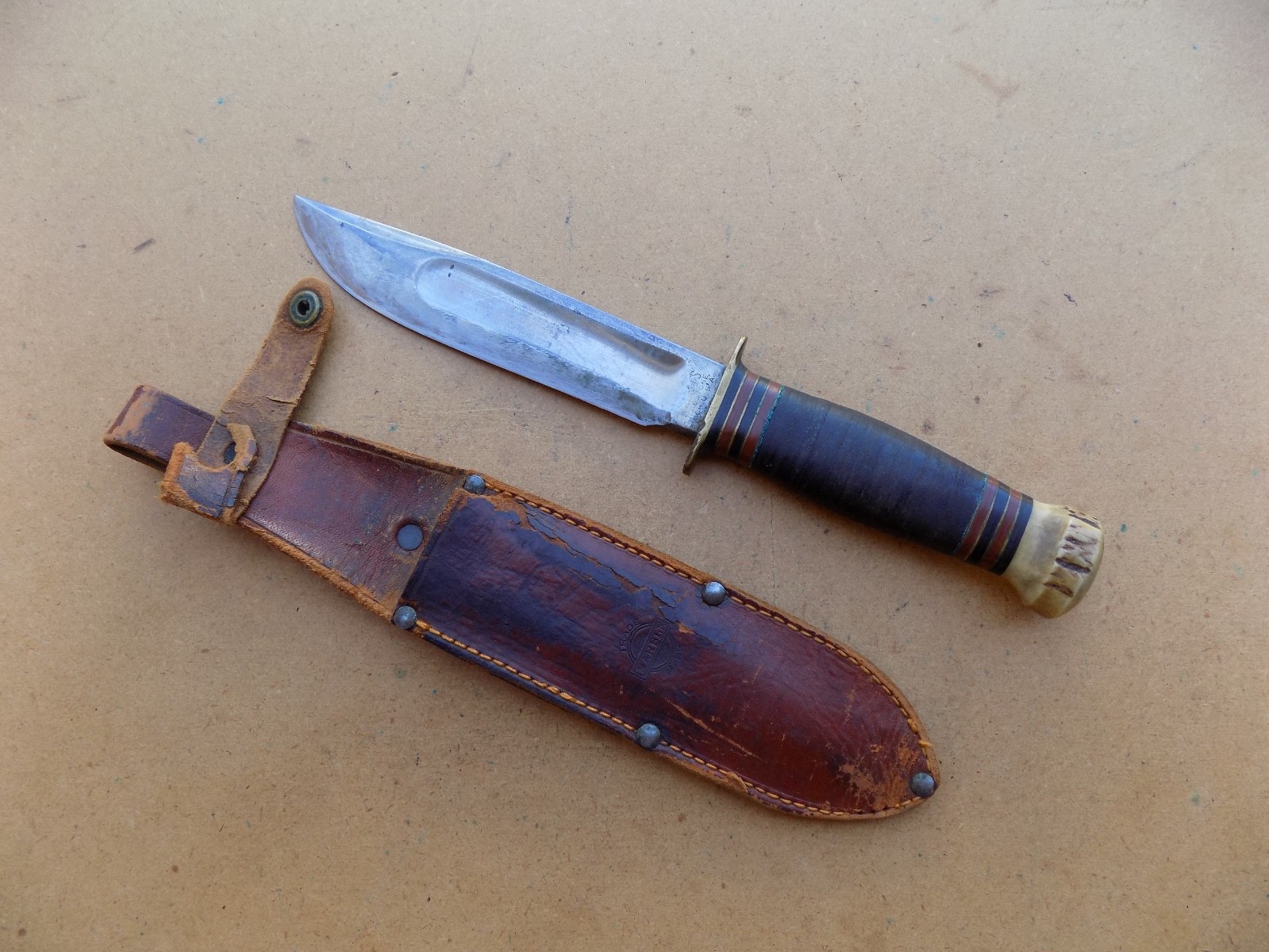 Old Vintage Marbles Ideal Knife with Stag Buttcap Pinwheel Button Sheath