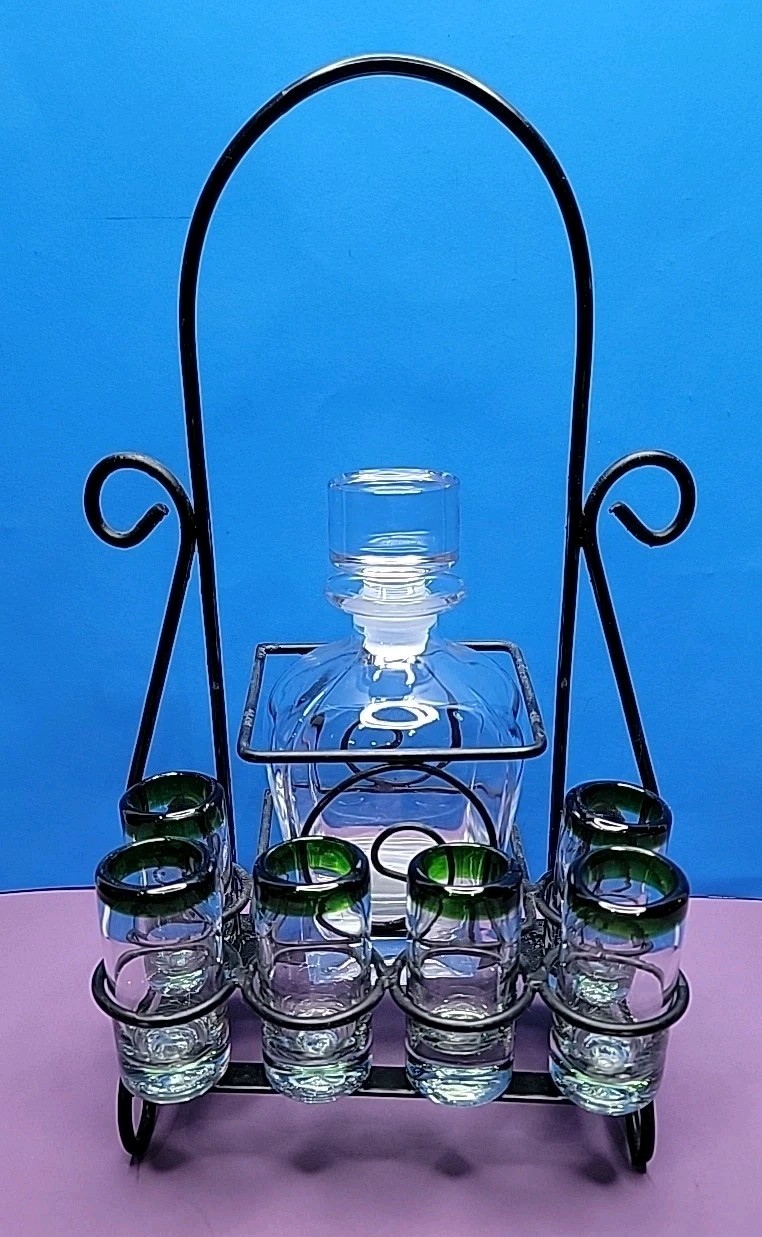Vintage Glass Decanter and 6 Green Rim Hand-Blown Shot Glasses In Metal Carrier.