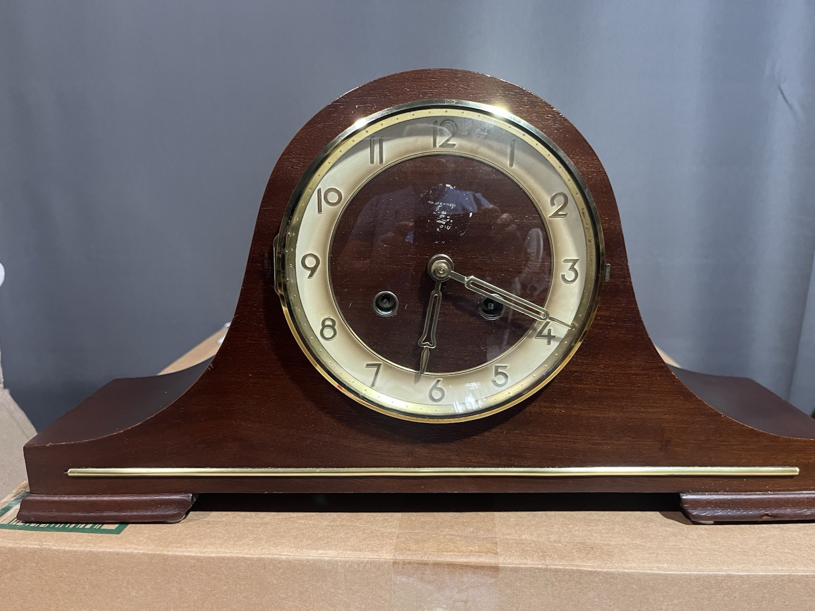 Mantel Clock With Hermle Movement is an 8-day unit with key.