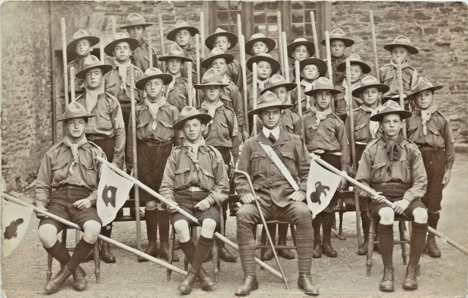 A Boy Scout Troop Poses With Their Walking Sticks, United Kingdom UK RPPC