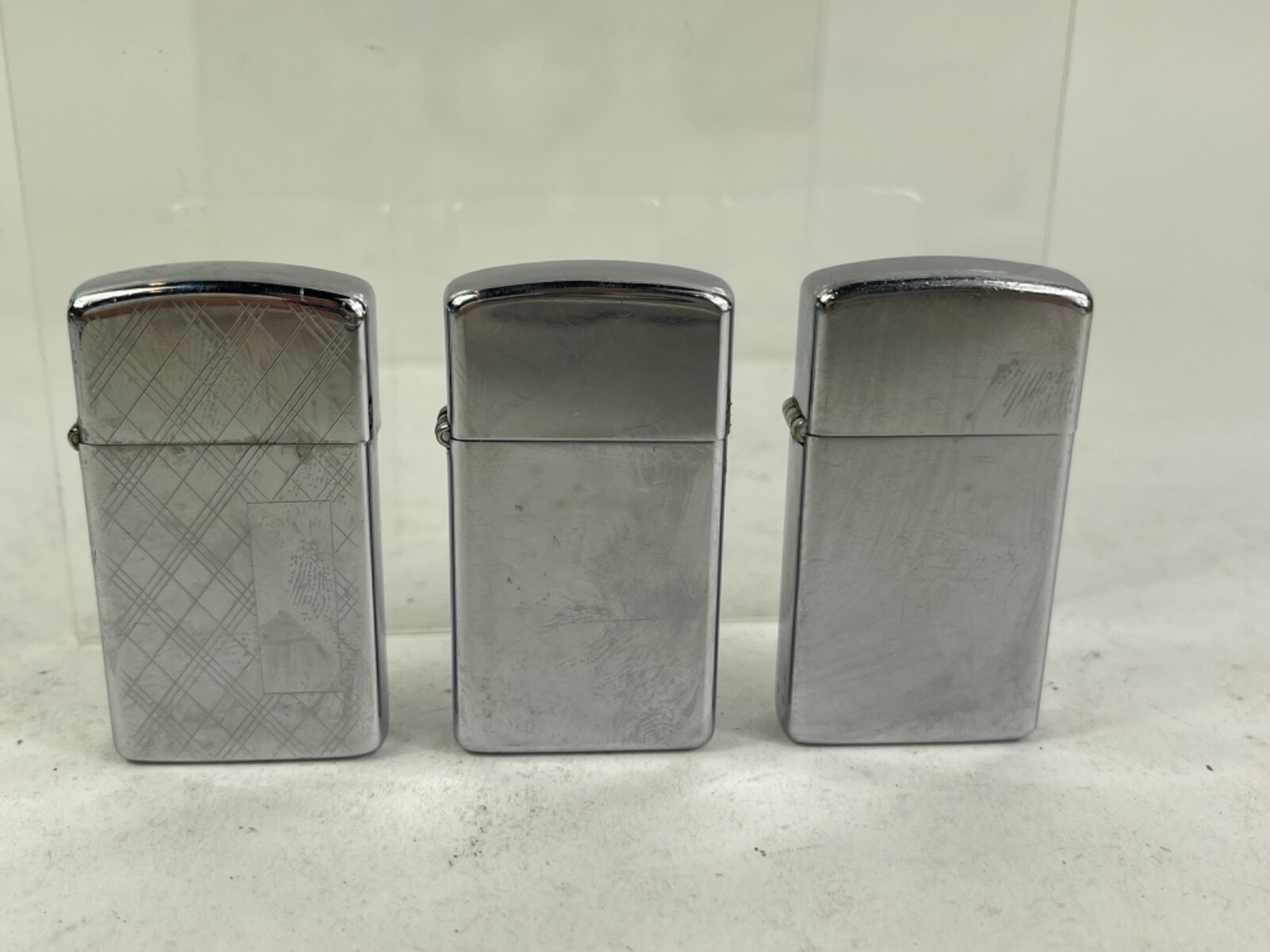 Collection of three Zippo SLIM Lighters Silver Chrome Satin finished