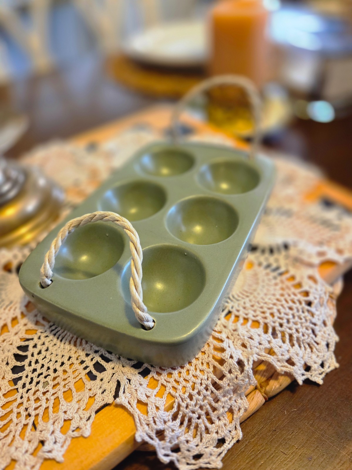 sage green ceramic earthenware egg holder with rope handles