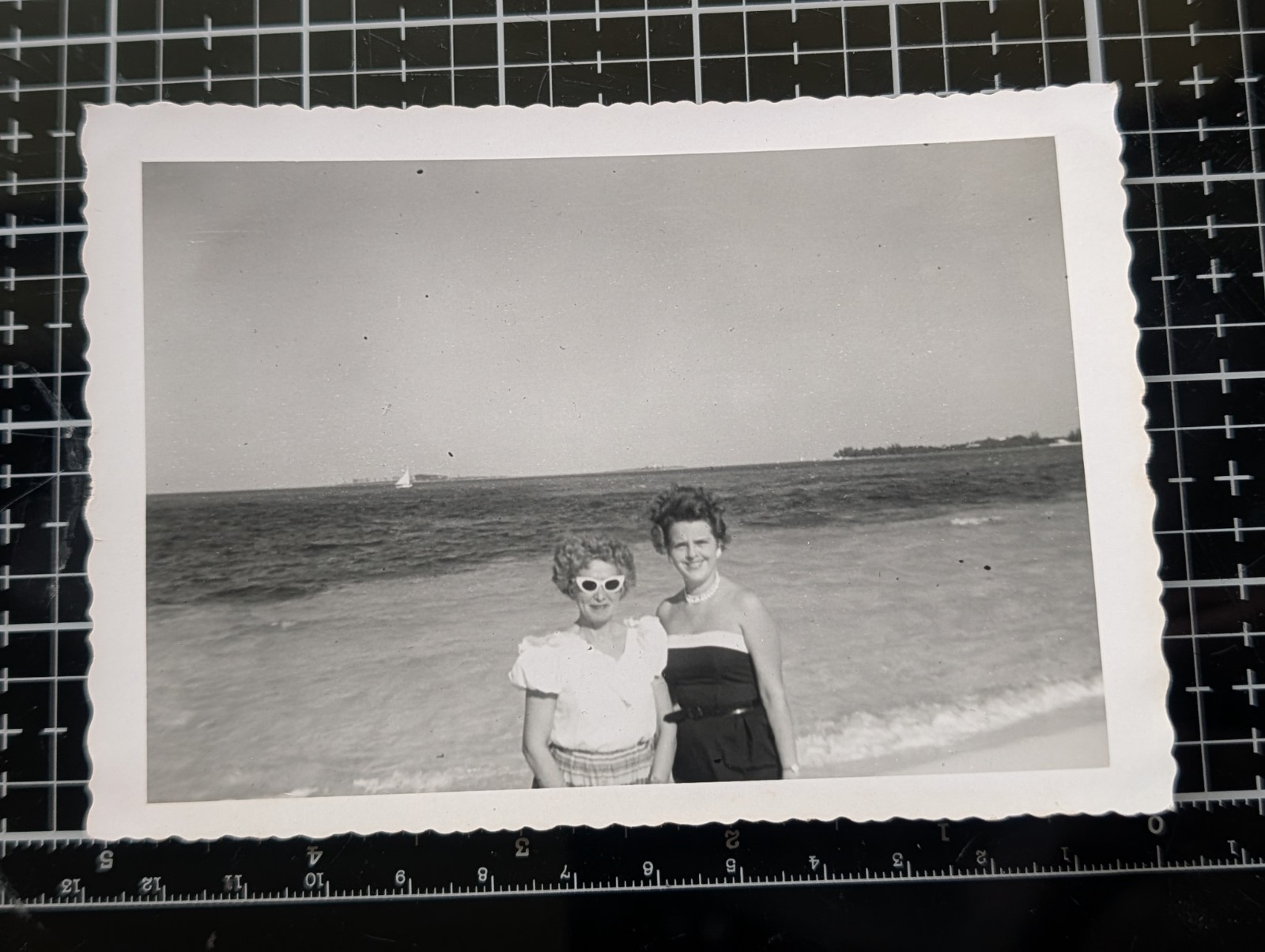 1958 Beach time with white cat eye glasses antique black and white photo