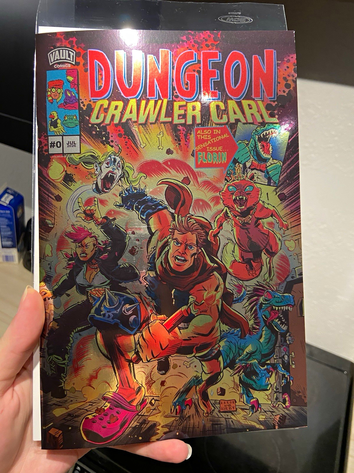 1 of 500 – Dungeon Crawler Carl #0 Coliseum of Comics – Jack Kirby Foil Variant!