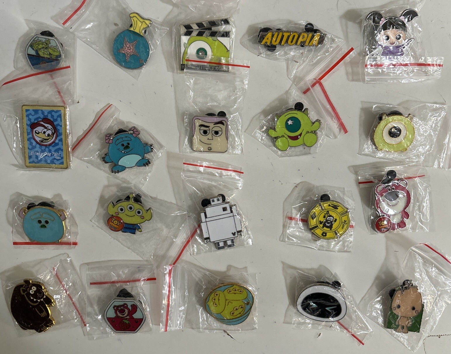 Disney PIXAR Pins lot of 20 Toy Story, Monster Inc, Brave, Cars, Nemo Etc