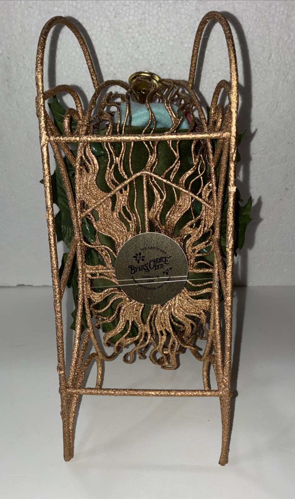Buyers Choice Singing Girl in Sleigh with Gift, Bell And Poinsettias, 10.5” X 9”