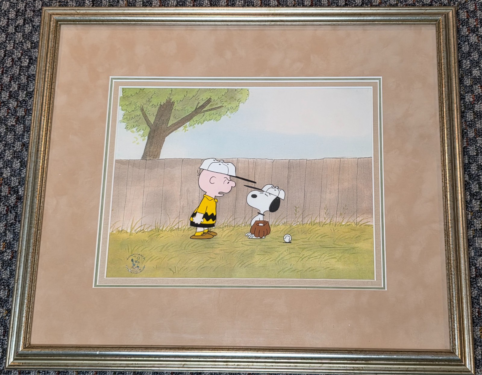 1970s/80s PRODUCTION CEL OF CHARLIE BROWN & SNOOPY – COA & PEANUTS SEAL FRAMED