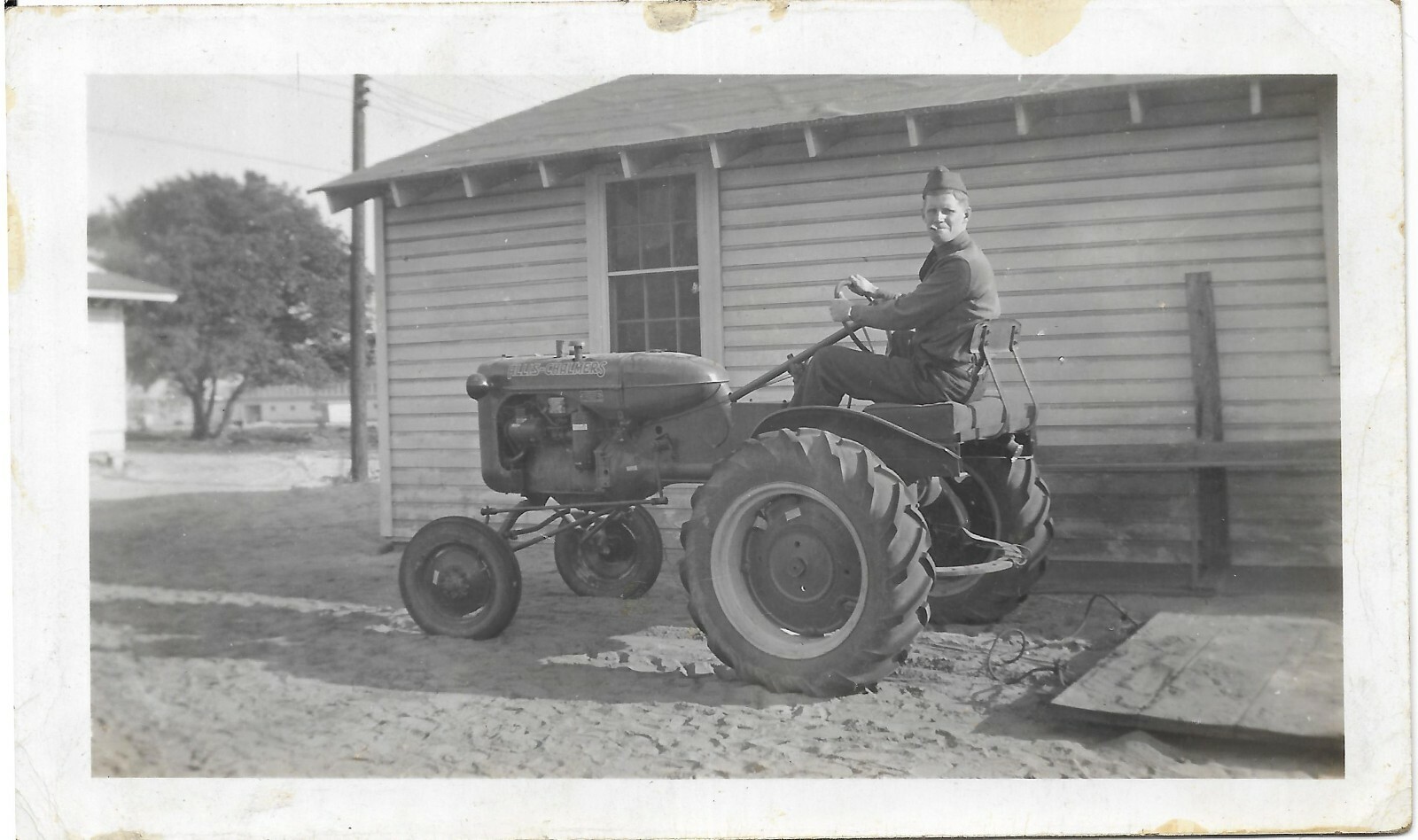 vintage photo man soldier smoking cigar sitting riding Allis-Chalmers tractor