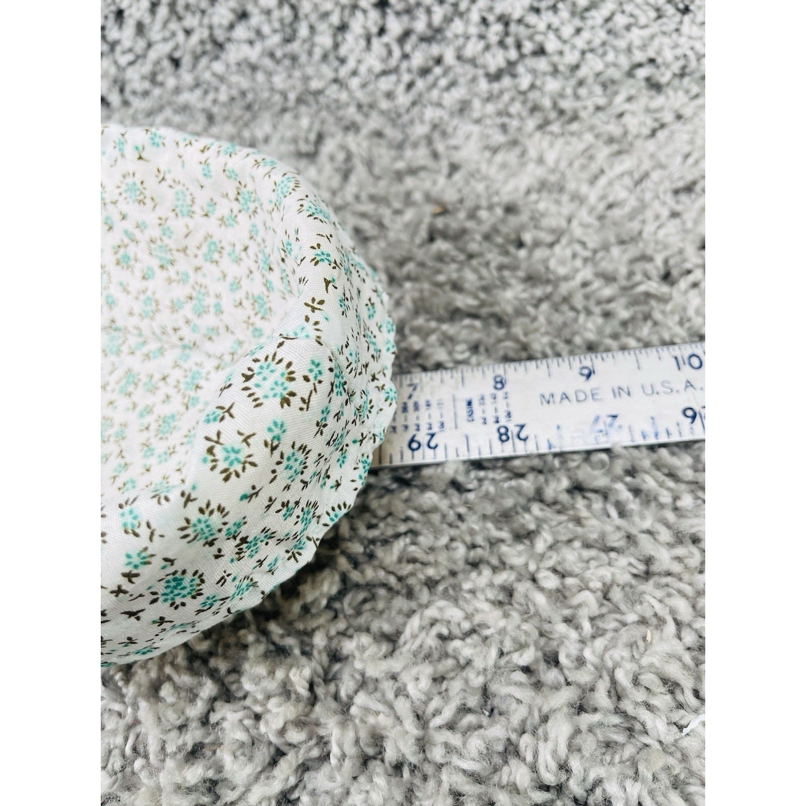Small Wicker Basket With a Removable Cloth Liner Featuring a Teal Floral Pattern