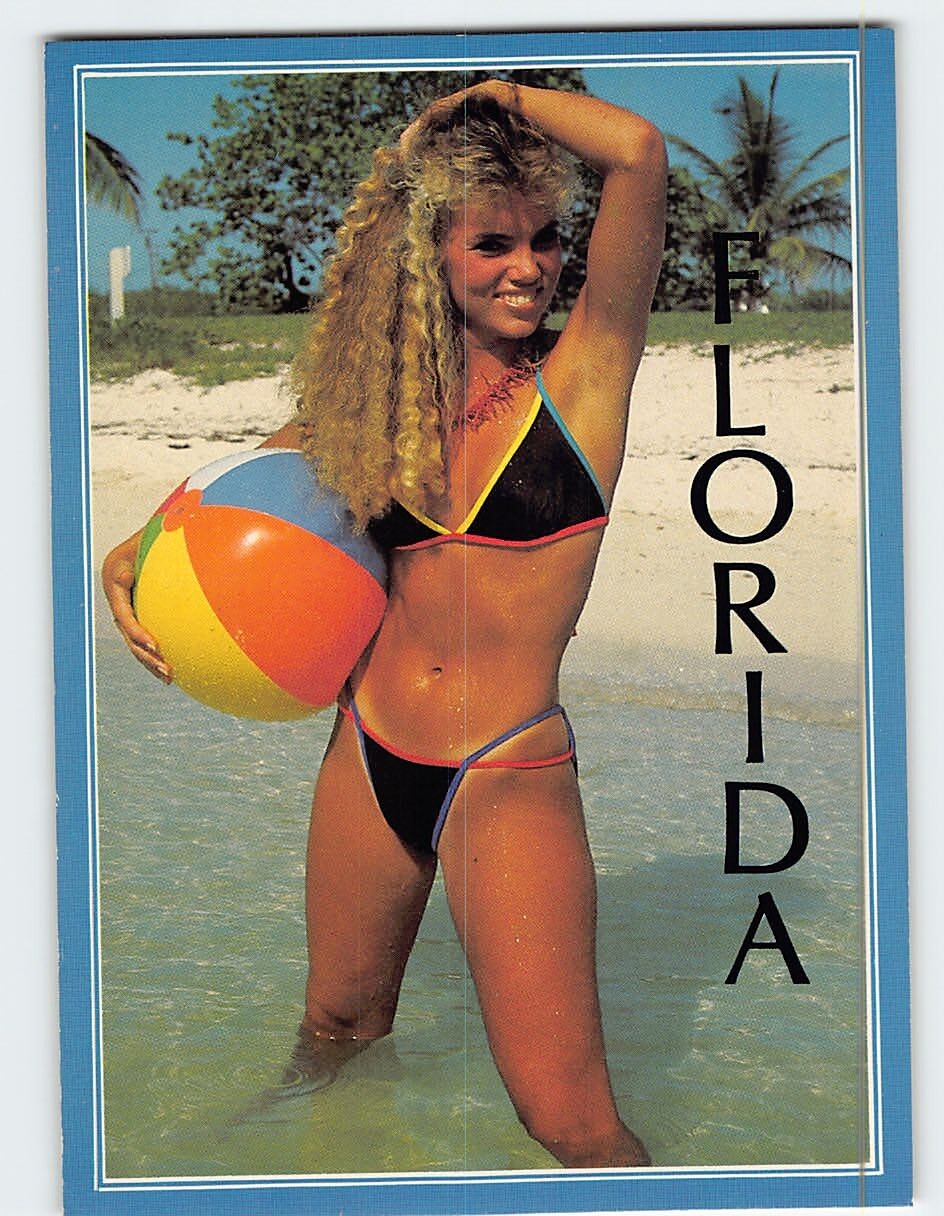 Postcard Its time to play ball on a secluded beach in tropical Florida USA