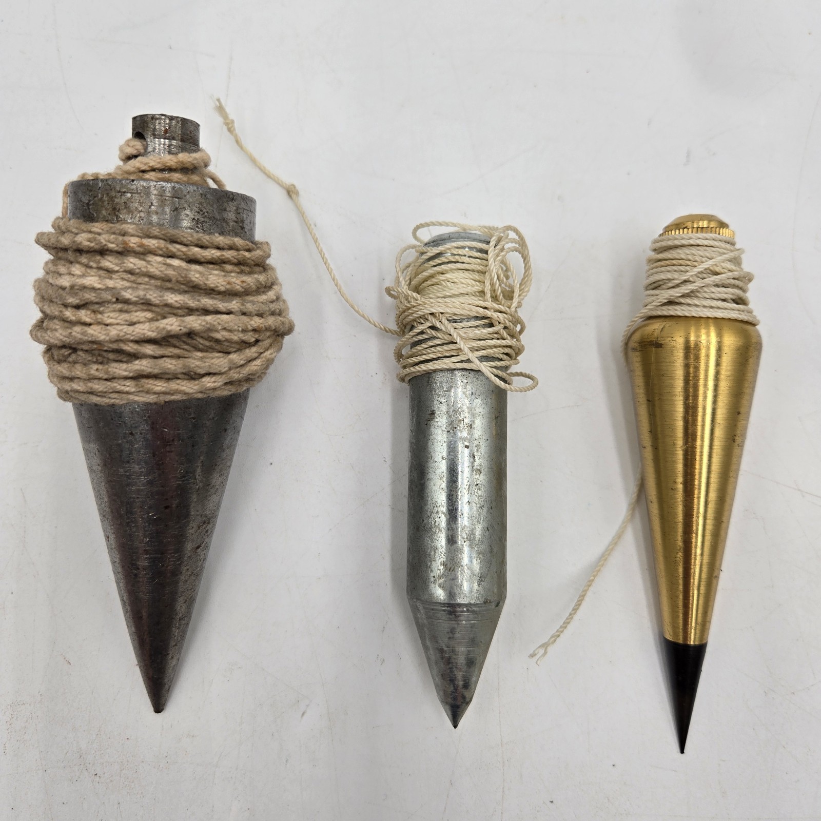 3 Vintage Plumb Bobs w/String – 1 Brass (8oz), 2 Steel ( 1.5lbs & 8oz)