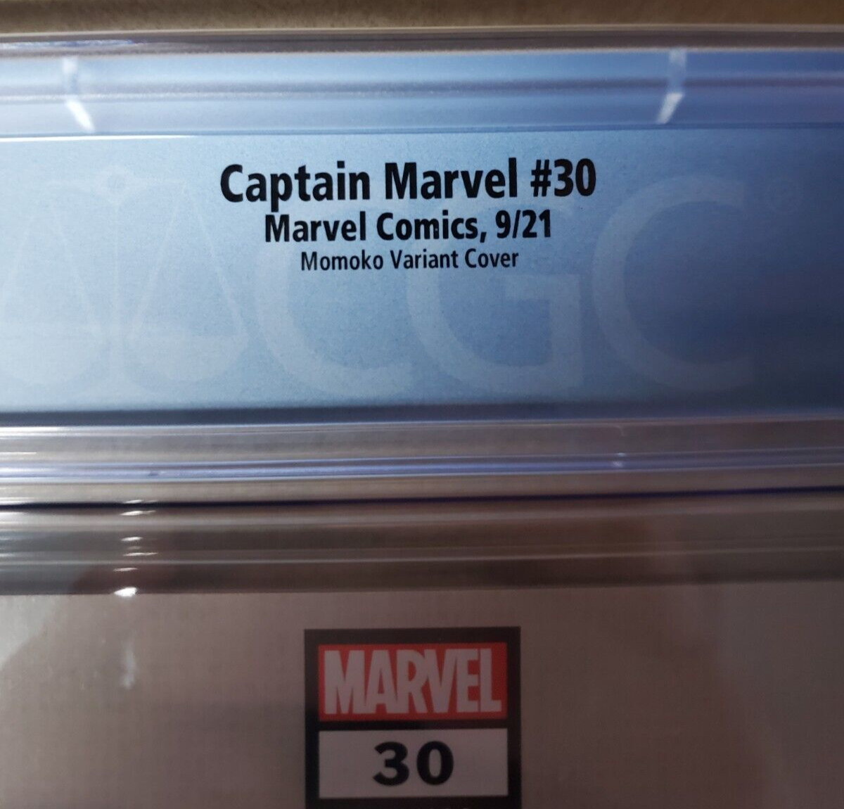 Captain Marvel Issue #30 Comic Book. Peach Momoko Variant Cover. CGC Graded.2021