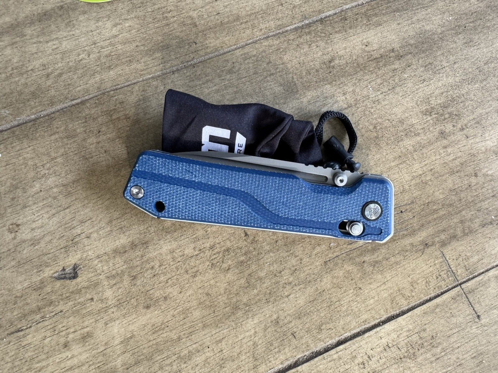 SRM Rubik 3.43″ Laminated 140Cr blade, blue Micarta 25 % off list, Lanyard incl