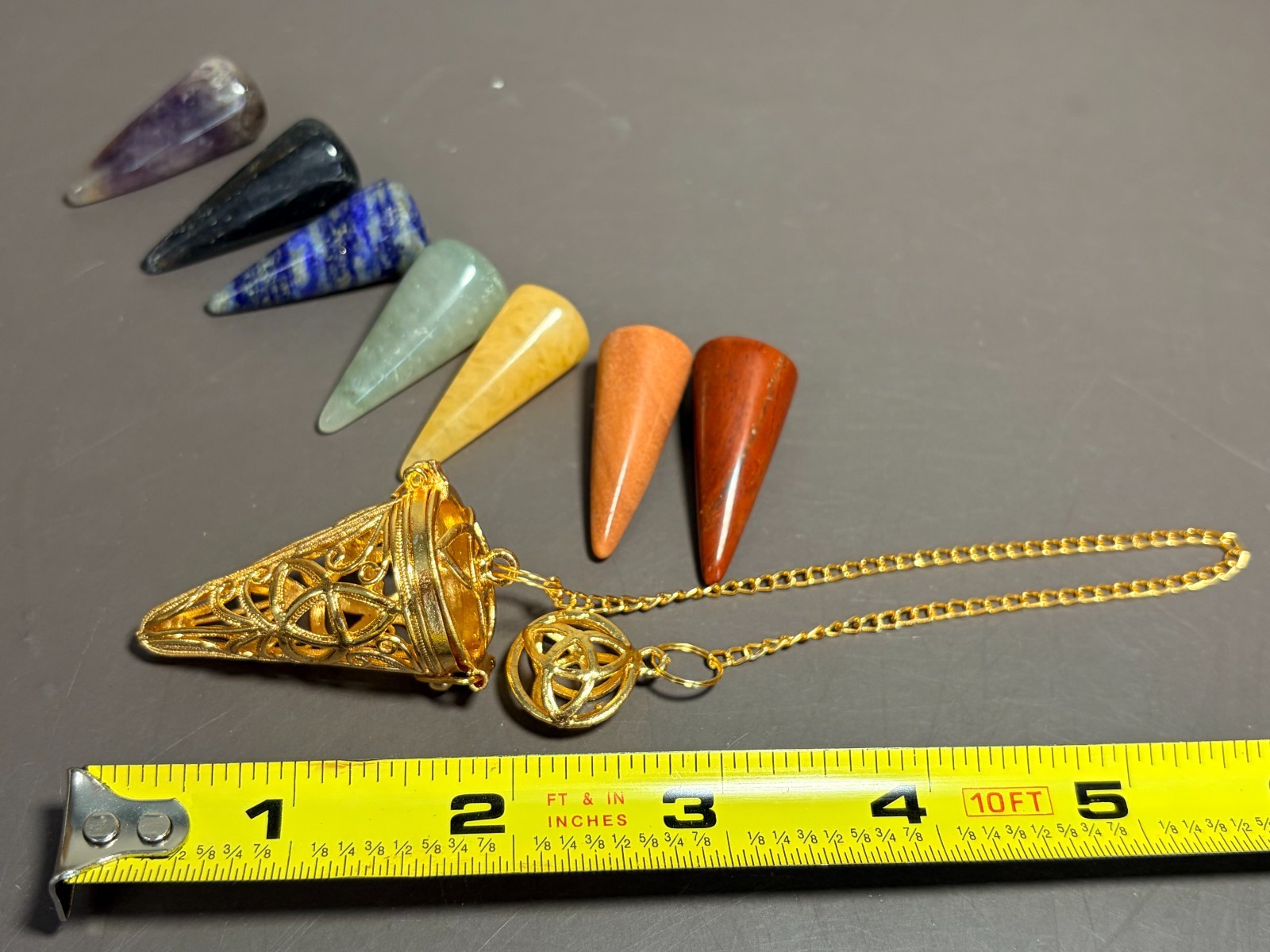 Chakra Pendulum Set of 7 Swappable Stones and Golden Om Hinged Cage NEW