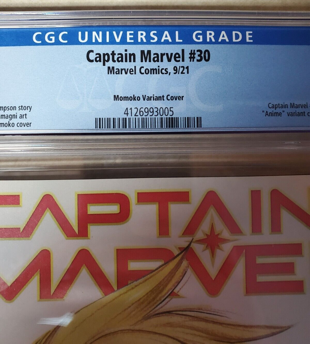 Captain Marvel Issue #30 Comic Book. Peach Momoko Variant Cover. CGC Graded.2021
