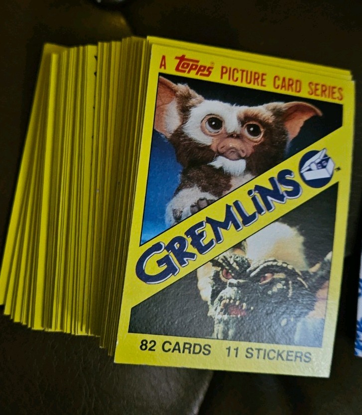 Gremlins 82 Card Topps Complete Set with 11 Sticker Set Excellent Condition.