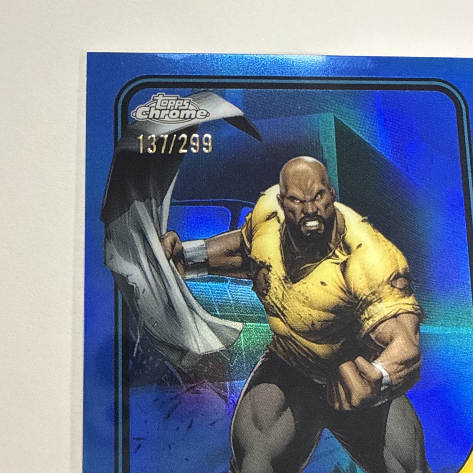 2024 Topps Chrome Marvel – Blue Parallel – 137/299 Luke Cage #111
