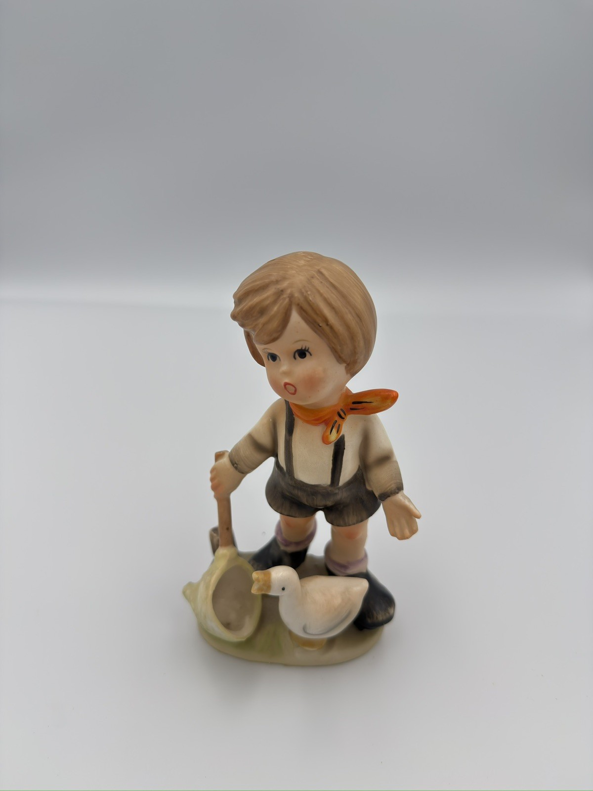 Napco Vintage Boy with Net and Pet Goose Figurine