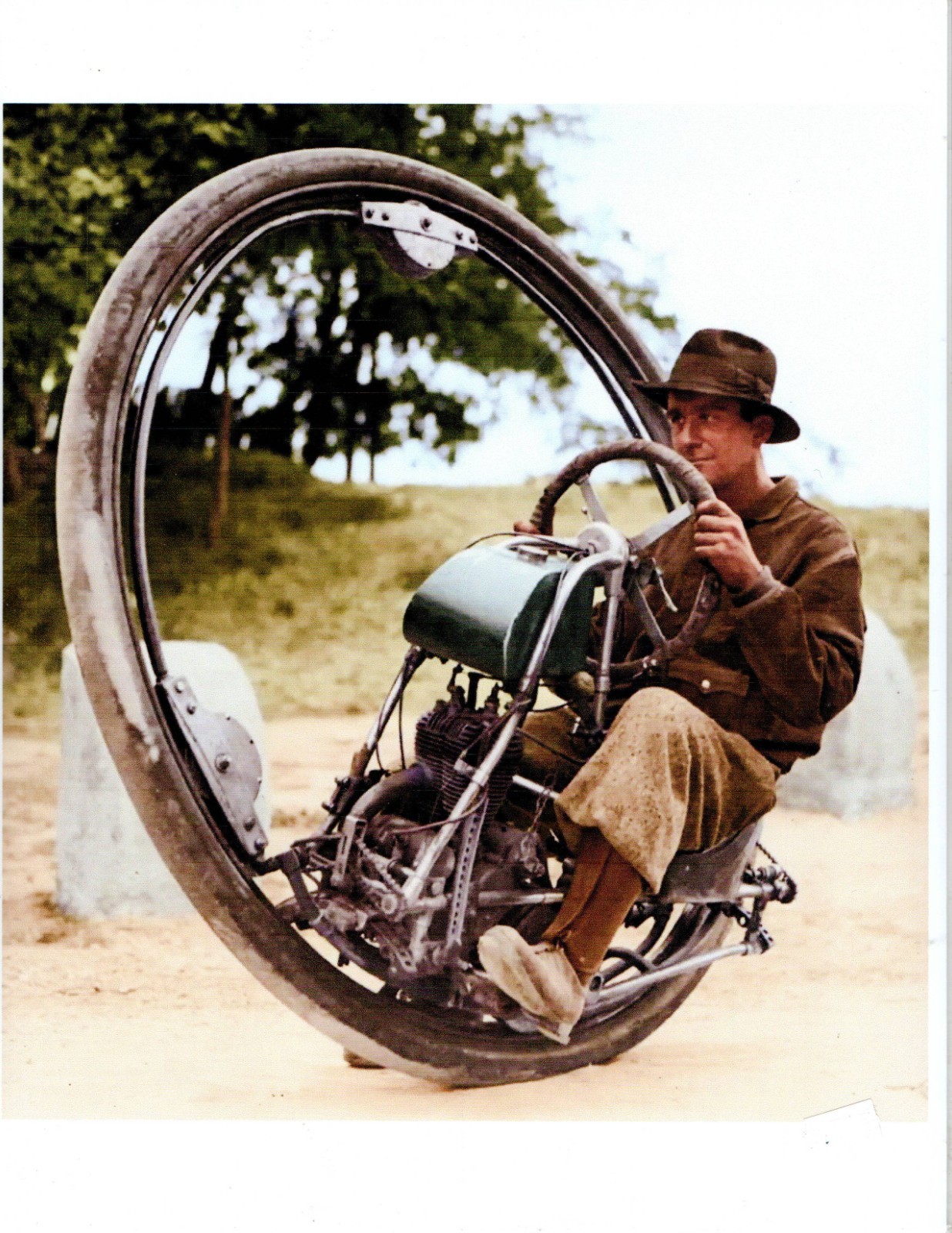 Man Riding Mono Cycle 8 1/2 x 11 Photo