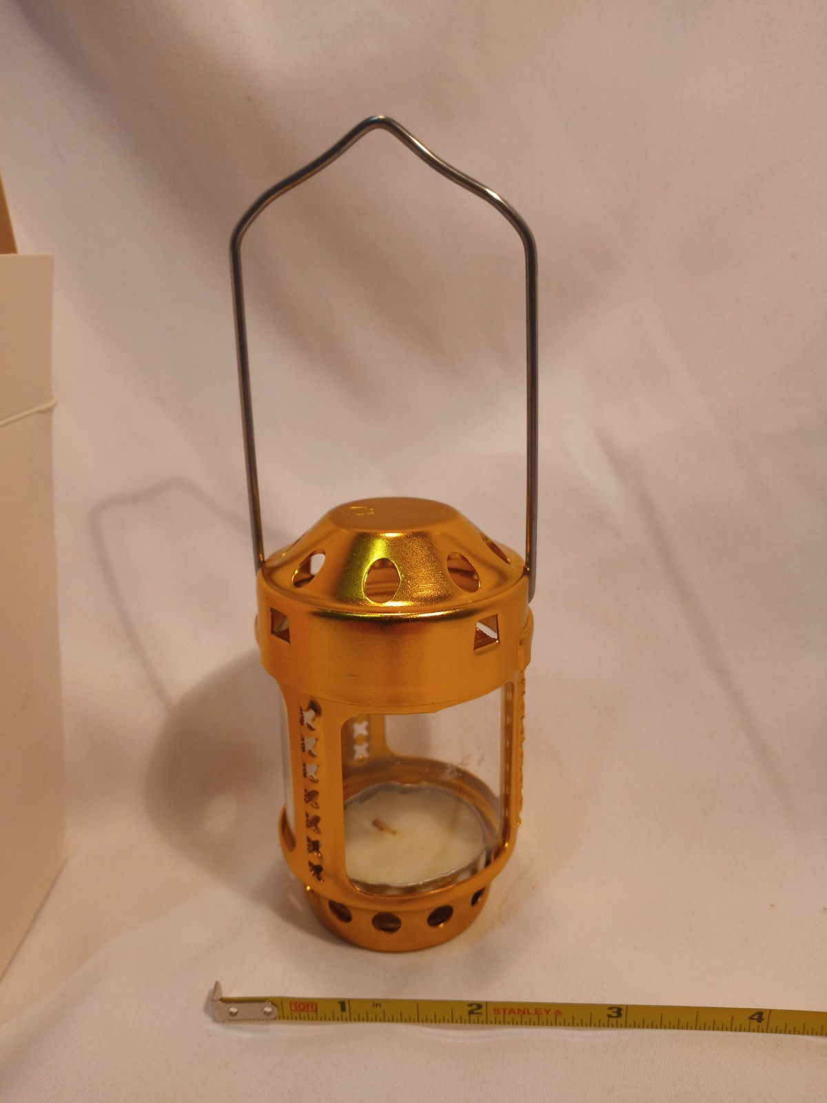 Coghlan’s tea light hanging lamp. Candle included