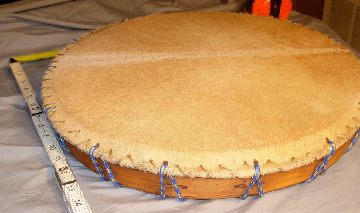 Pow Wow Drum: 16.5 inches in diameter 2.5 tall raw hide top. Northern tribe