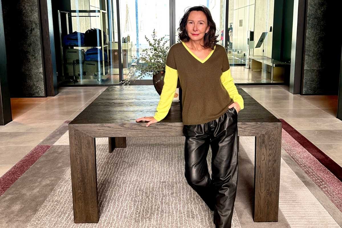 Claudia Hackman smiling in the elegant lobby of Park Hyatt Niseko.