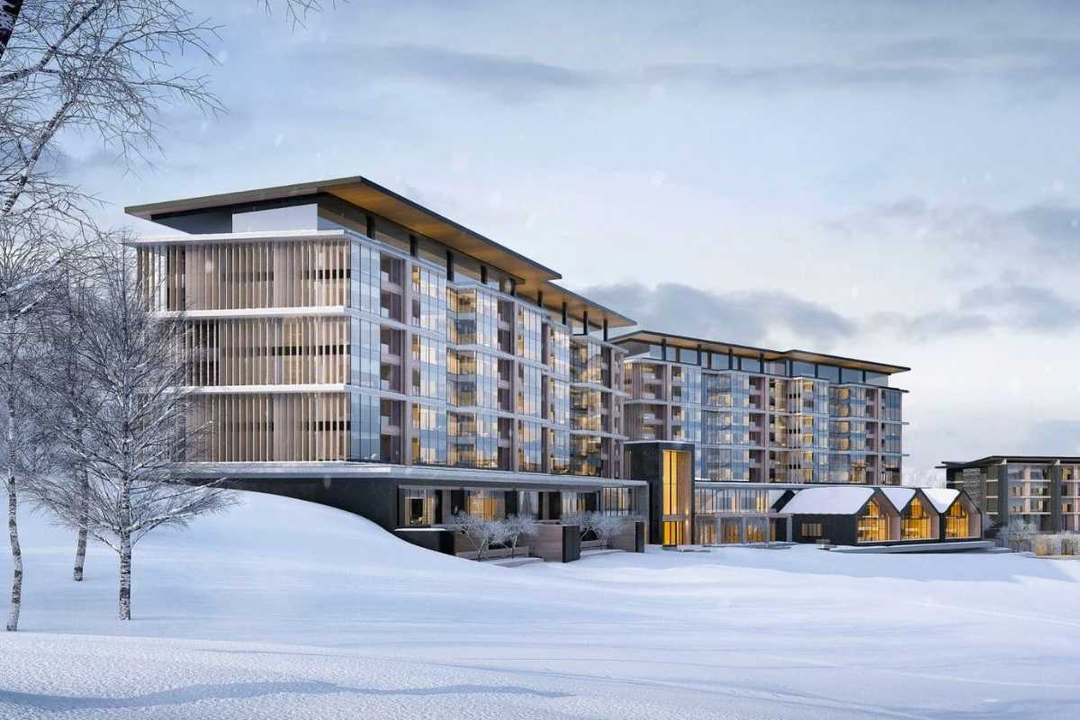 Exterior view of Park Hyatt Niseko covered in snow during winter.